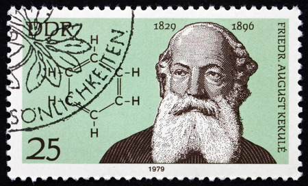 GERMANY - CIRCA 1979: a stamp printed in Germany shows Friedrich August Kekule, German Organic Chemist, and Benzene Ring, circa 1979のeditorial素材