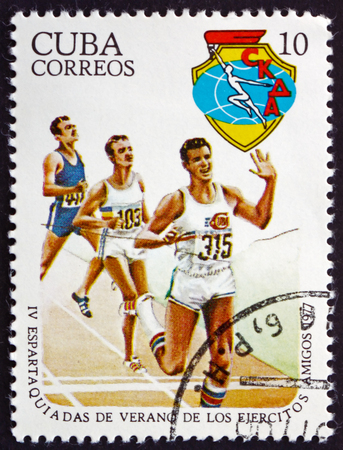CUBA - CIRCA 1977: a stamp printed in the Cuba shows Running, 4th Military Spartakiad, circa 1977のeditorial素材