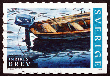 SWEDEN - CIRCA 2002: a stamp printed in the Sweden shows Boat with Outboard Motor, Summer in Bohuslan, Sweden, circa 2002のeditorial素材