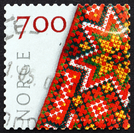NORWAY - CIRCA 2001: a stamp printed in the Norway shows Embroidered Bunad, Crafts, circa 2001のeditorial素材
