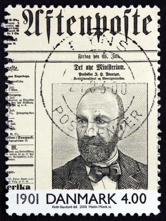 DENMARK - CIRCA 2000: a stamp printed in the Denmark shows Prof. J. H. Deuntzer on Front Page of Newspaper, circa 2000のeditorial素材