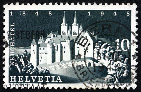 SWITZERLAND - CIRCA 1948: a stamp printed in the Switzerland shows Castle at Neuchatel, circa 1948のeditorial素材