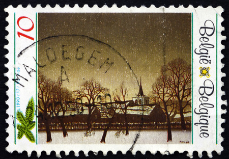 BELGIUM - CIRCA 1990: a stamp printed in the Belgium shows Winter Scene, Painting by Jozef Lucas, Christmas, circa 1990のeditorial素材