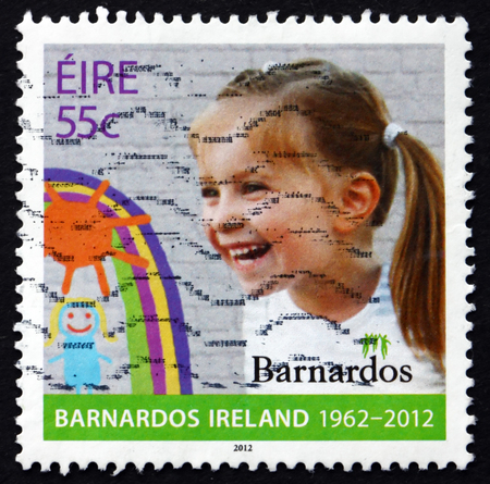 IRELAND - CIRCA 2012: a stamp printed in the Ireland shows Girl, 50th Anniversary of the Organisation Barnados Ireland, circa 2012のeditorial素材