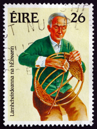 IRELAND - CIRCA 1983: A stamp printed in Ireland shows Basket Weaving, Handicraft, circa 1983のeditorial素材