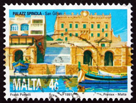 MALTA - CIRCA 1991: a stamp printed in Malta shows Spinola Palace, St. Julians, circa 1991のeditorial素材