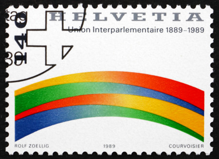 SWITZERLAND - CIRCA 1989: a stamp printed in Switzerland dedicated to Centenary of the Interparliamentary Union, circa 1989のeditorial素材