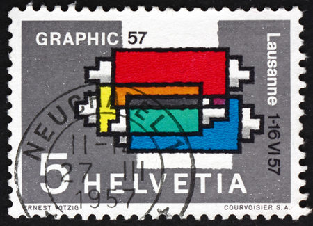 SWITZERLAND - CIRCA 1957: a stamp printed in Switzerland shows Inking Device, Printing Machine, International Exhibition for Graphic Arts, Lausanne, circa 1957のeditorial素材
