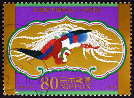 JAPAN - CIRCA 2009: a stamp printed in the Japan shows Takamikura Hamayuka Houou, 20th Anniversary Akihito's Accession to Throne, circa 2009のeditorial素材