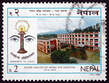 NEPAL - CIRCA 1999: a stamp printed in the Nepal shows Nepal Eye Hospital, 25th Anniversary, circa 1999のeditorial素材