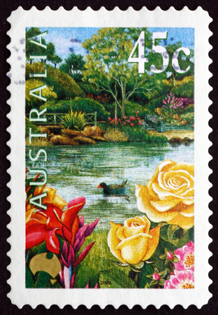 AUSTRALIA - CIRCA 2000: a stamp printed in the Australia shows Garden, Pond, Roses and Purple Swamphen, circa 2000のeditorial素材