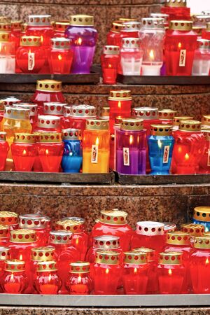 Votive candles glows on a grave, lanternの写真素材