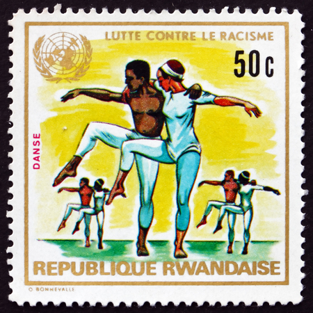 RWANDA - CIRCA 1980: a stamp printed in Rwanda shows Dancers, Fight Against Racism, circa 1980のeditorial素材