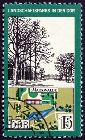 GERMANY - CIRCA 1981: a stamp printed in Germany shows View and Map of Marxwalde Park, Germany, circa 1981のeditorial素材