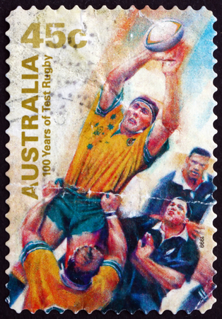 AUSTRALIA - CIRCA 1999: a stamp printed in the Australia shows Catching Ball, Test Rugby in Australia, Centenary, circa 1999のeditorial素材