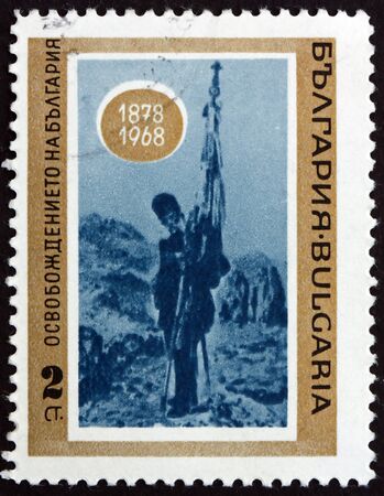 BULGARIA - CIRCA 1968: a stamp printed in Bulgaria shows Flag of Samara, Painting by J. Veschin, 90th Anniversary of the Liberation from Turkey, circa 1968のeditorial素材