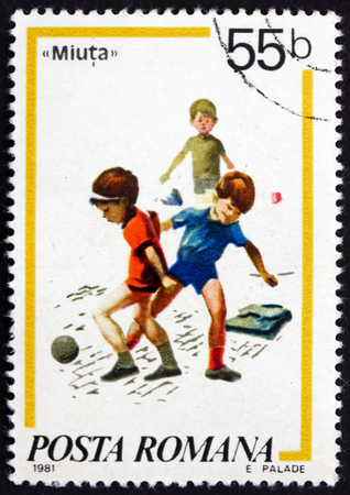 ROMANIA - CIRCA 1981: a stamp printed in Romania shows Soccer, Children's Games, circa 1981のeditorial素材