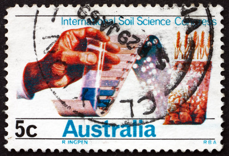 AUSTRALIA - CIRCA 1968: a stamp printed in Australia shows Soil Testing Through Chemistry and by Computer, 9th International Congress of Soil Science, University of Adelaide, circa 1968のeditorial素材