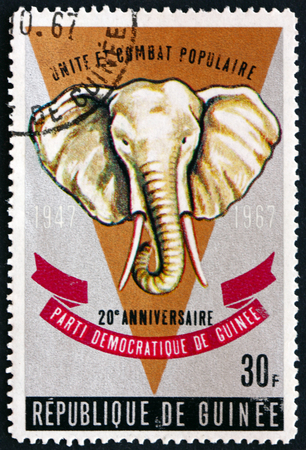 GUINEA - CIRCA 1967: a stamp printed in Guinea shows Elephant, 20th Anniversary of the Democratic Party of Guinea, circa 1967のeditorial素材