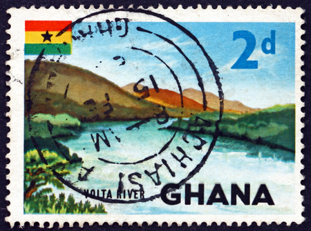 GHANA - CIRCA 1967: a stamp printed in Ghana shows View of Volta river, circa 1967のeditorial素材