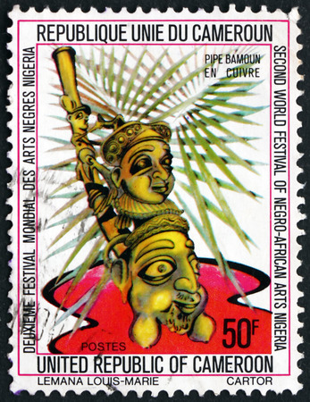 CAMEROON - CIRCA 1977: a stamp printed in Cameroon shows Bamoun copper pipe, 2nd world black and African festival, Lagos, Nigeria, circa 1977のeditorial素材