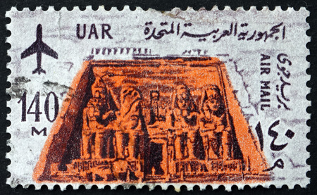 EGYPT - CIRCA 1963: a stamp printed in Egypt shows The great temple of Ramses II at Abu Simbel, circa 1963のeditorial素材