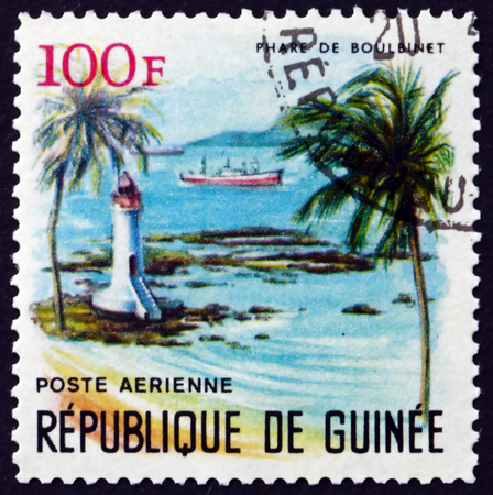 GUINEA - CIRCA 1966: a stamp printed in Guinea shows Boulbinet Lighthouse, circa 1966のeditorial素材