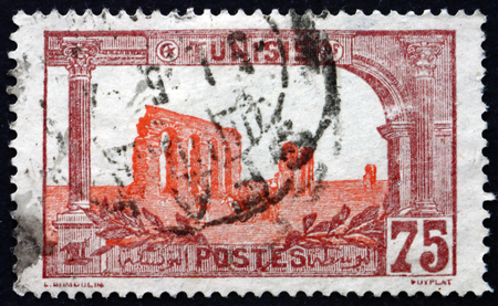 TUNISIA - CIRCA 1906: a stamp printed in Tunisia shows Ruins of Hadrian's aqueduct, circa 1906のeditorial素材