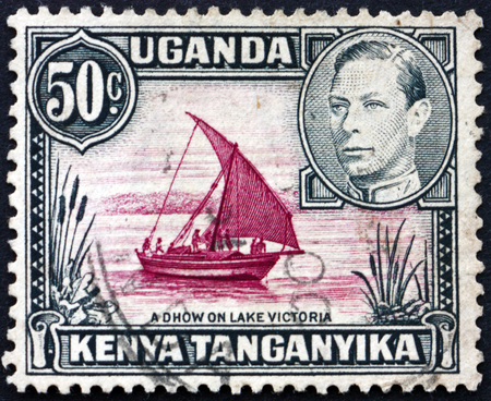 EAST AFRICAN POSTAL UNION - CIRCA 1949: a stamp printed in East African Postal Union (Kenya, Uganda, Tanganyika) shows Dhow on lake Victoria, circa 1949のeditorial素材
