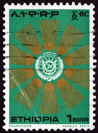 ETHIOPIA - CIRCA 1976: a stamp printed in Ethiopia shows Sunburst Around Crest, circa 1976のeditorial素材