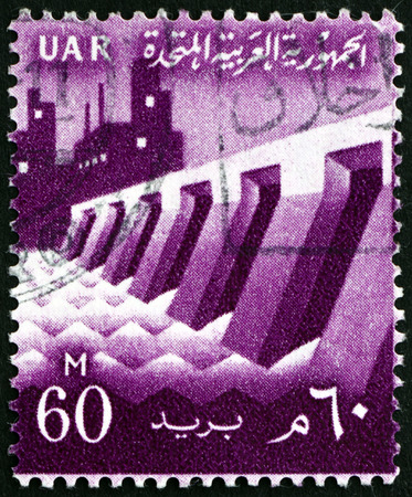 EGYPT - CIRCA 1959: a stamp printed in Egypt shows Dam and Factory, circa 1959のeditorial素材
