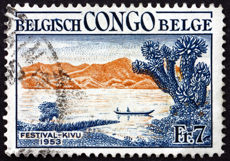 BELGIAN CONGO - CIRCA 1953: a stamp printed in Belgian Congo shows Canoe on Lake Kivu, Kivu Festival, circa 1953のeditorial素材