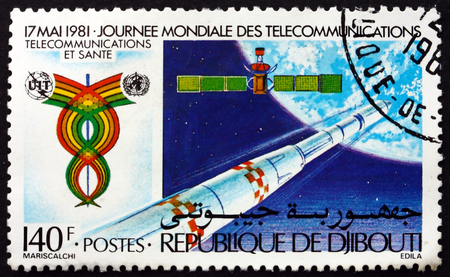 DJIBOUTI - CIRCA 1981: a stamp printed in Djibouti shows Rocket and Satellite, 13th World Telecommunications Day, circa 1981のeditorial素材