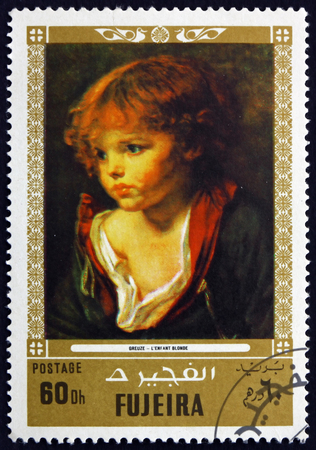 FUJEIRA - CIRCA 1972: a stamp printed in the Fujeira shows a Blond Haired Boy with an Open Shirt, Painting by Jean Baptiste Greuze, French Painter, circa 1972のeditorial素材