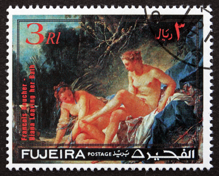 FUJEIRA - CIRCA 1971: a stamp printed in Fujeira shows Diana Leaving her Bath, Painting by Francois Boucher. Diana was goddess of the hunt, circa 1971のeditorial素材