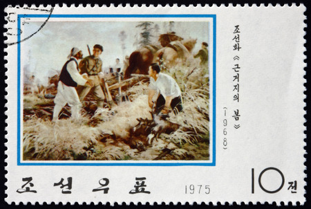 NORTH KOREA - CIRCA 1975: a stamp printed in North Korea shows The Guerrilla Base in Spring (1968), Korean Painting, circa 1975のeditorial素材