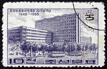 NORTH KOREA - CIRCA 1975: a stamp printed in North Korea shows Kim Il Sung University, 20th Anniversary, circa 1975のeditorial素材