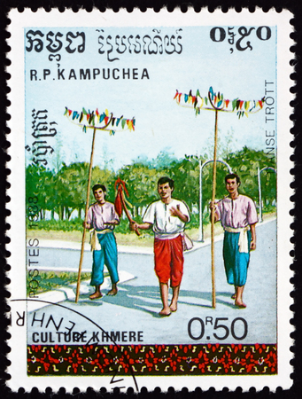 CAMBODIA - CIRCA 1988: a stamp printed in Cambodia shows three dancers, traditional dance, circa 1988のeditorial素材