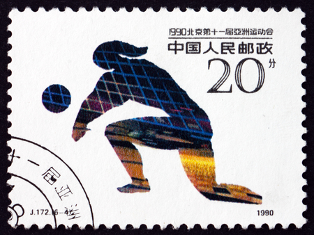CHINA, PEOPLES REPUBLIC OF - CIRCA 1990: a stamp printed in the China shows volleyball, 11th Asian games, Beijing, circa 1990のeditorial素材