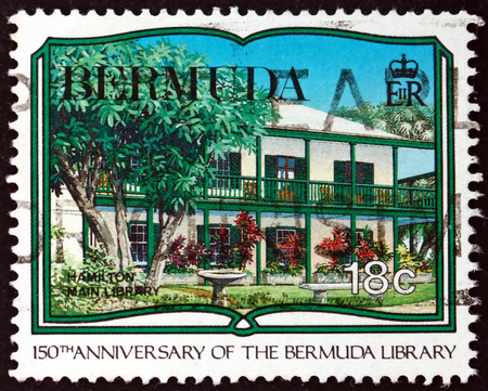 BERMUDA - CIRCA 1989: a stamp printed in Bermuda shows Hamilton main library, 150th anniversary of the Bermuda library, circa 1989のeditorial素材