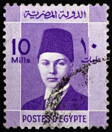 EGYPT - CIRCA 1937: a stamp printed in Egypt shows King Farouk of Egypt, Portrait, circa 1937のeditorial素材