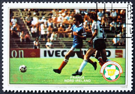 BELIZE - CIRCA 1982: a stamp printed in Belize shows France vs. Northern Ireland, World Cup Soccer Championship, circa 1982のeditorial素材