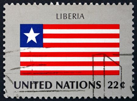 UNITED NATIONS - CIRCA 1985: a stamp printed in the United Nations shows National Flag of Liberia, circa 1985のeditorial素材