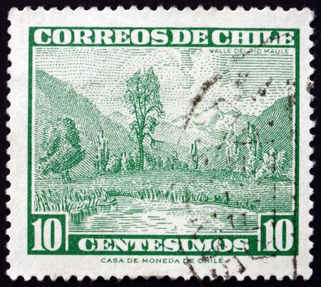 CHILE - CIRCA 1962: a stamp printed in Chile shows Maule River Valley, Landscape, circa 1962のeditorial素材