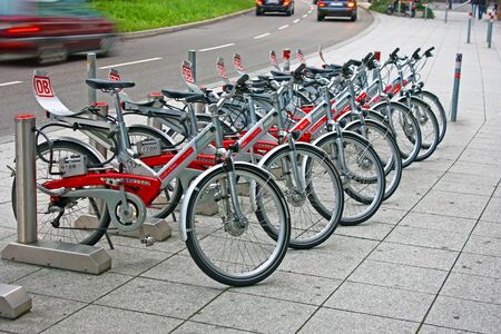 SUTTGART, GERMANY - SEPTEMBER 15, 2010: A row of bikes for rent at automatic rental station in Stuttgart, Germanyのeditorial素材