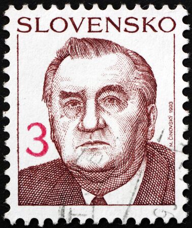SLOVAKIA - CIRCA 1993: a stamp printed in Slovakia shows Michal Kovac, was the first President of Slovakia, having served from 1993 through 1998, circa 1993のeditorial素材