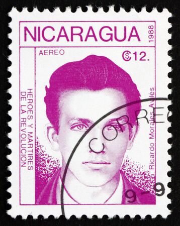 NICARAGUA - CIRCA 1988: a stamp printed in Nicaragua shows Ricardo Morales Aviles, hero of the revolution, circa 1988のeditorial素材