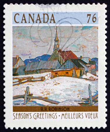 CANADA - CIRCA 1989: a stamp printed in Canada shows church of St. Agnes, painting by Albert H. Robinson, winter landscape, circa 1989のeditorial素材