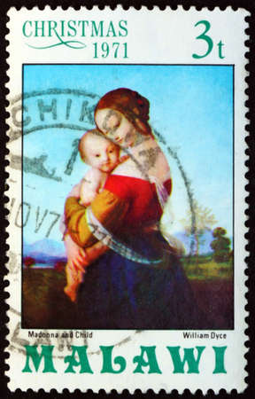 MALAWI - CIRCA 1971: a stamp printed in Malawi shows Madona and Child, painting by William Dyce, Scottish artist, circa 1971のeditorial素材