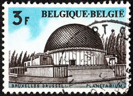 BELGIUM - CIRCA 1974: a stamp printed in Belgium shows the planetarium of the Royal Observatory of Belgium, Brussels, circa 1974のeditorial素材